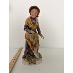 vtg ardco porcelain figurine of old woman with a basket and rabbit